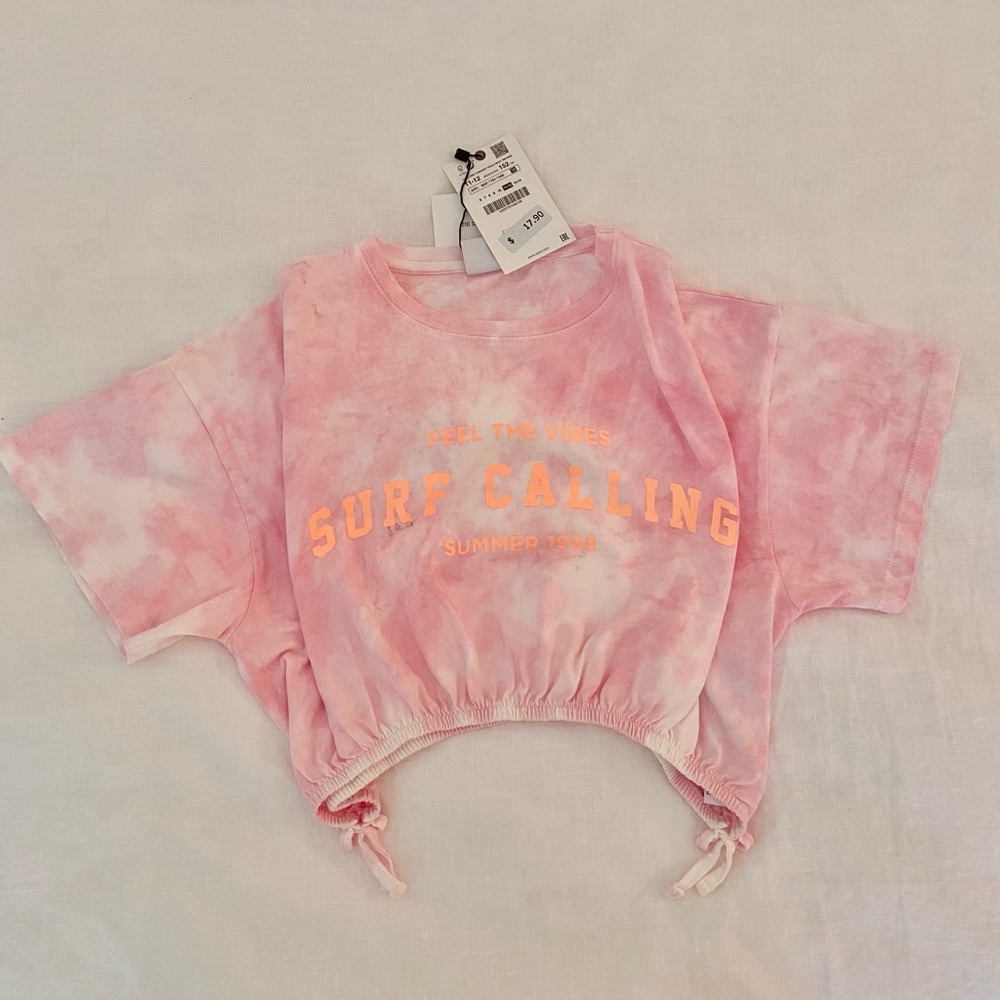 NWT. Zara Girls pink & white tie-dye, semi-crop top, “surf calling”, size 11/12.